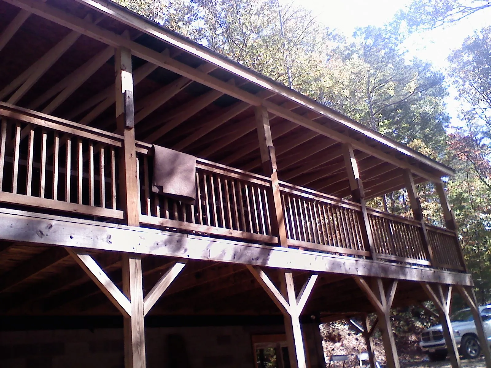 Timber framing under a new elevated porch and deck — Roof Leak Repair in Haysville by Roofing Brothers